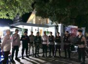 Personel Ops Lilin Rinjani 2024 Polres Bima Kota Bersiaga Amankan Malam Misa Natal di Gereja Santo Yusuf Raba