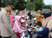 Kapolres Bima Kota dan Polisi Cilik TK Kemala Bhayangkari Meriahkan Ramadhan dengan Berbagi Takjil