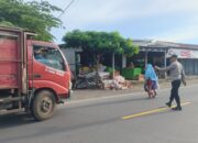 Polsek Gangga Laksanakan Rawan Pagi di Depan Pasar Gondang untuk Wujudkan Keamanan dan Kelancaran Arus Lalu Lintas